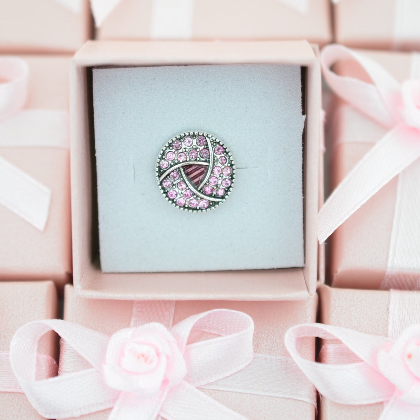 Pink design charm for watch bands and belts