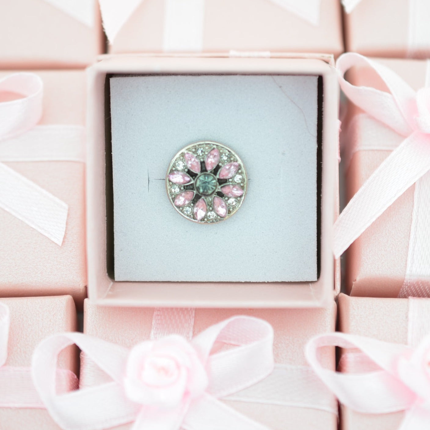 Pink design charm for watch bands and belts